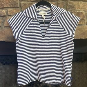 Free Assembly blue and white striped V-neck top with side slits. Size XS